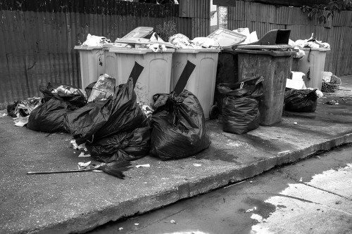 Professional rubbish clearance team at work in Enfield Highway