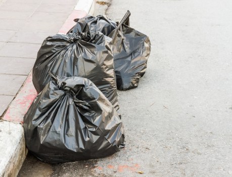 Various types of waste being cleared in Colliers Wood